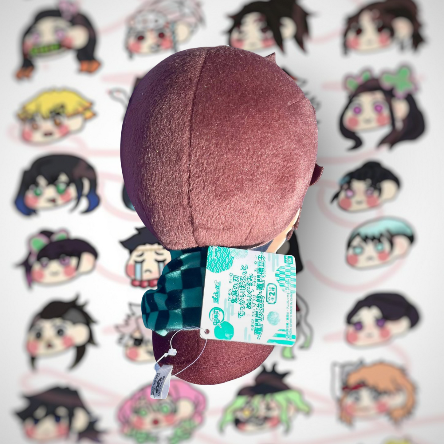 Grande peluche Kimetsu No Yaiba Kamado Tanjiro assis