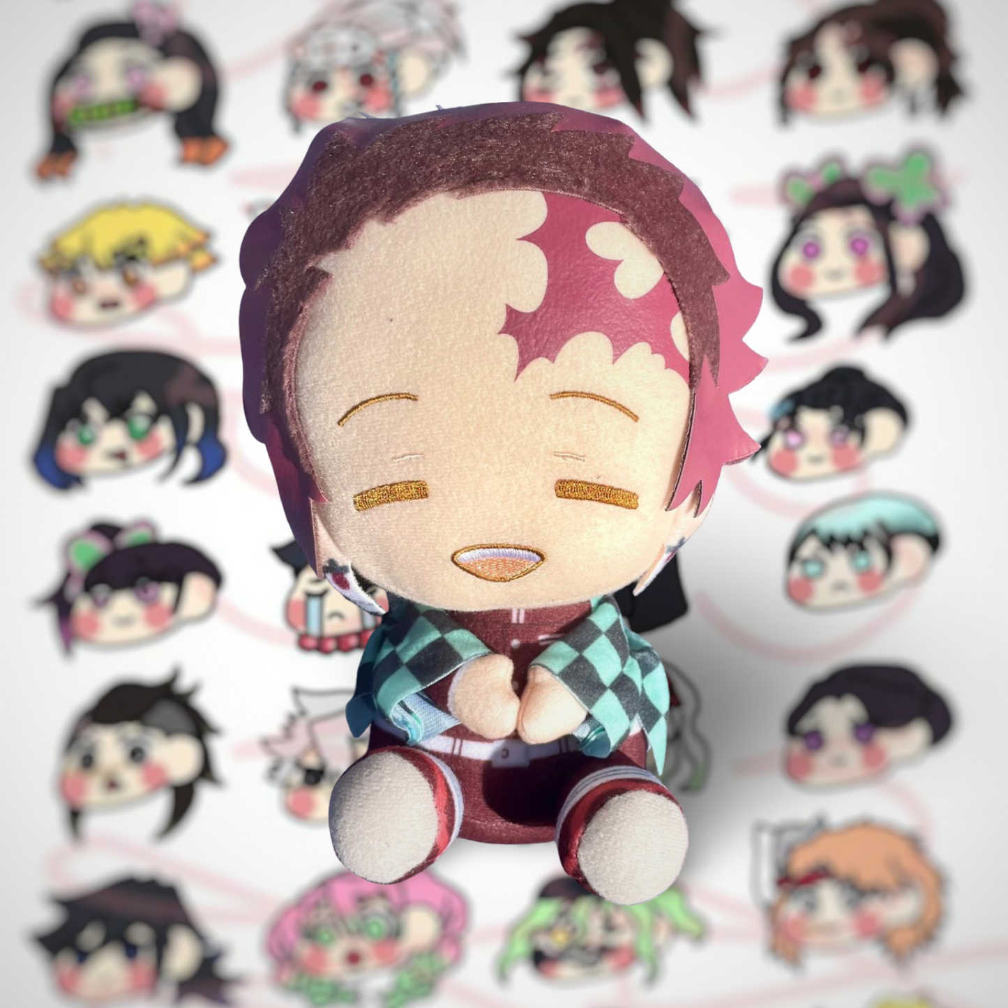 Grande peluche Kimetsu No Yaiba Kamado Tanjiro assis